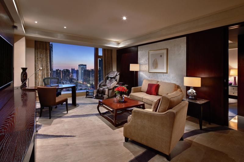 BEI-Gold Signature Suite-Living Room.jpg