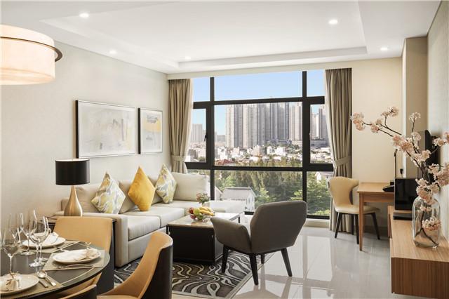 Oakwood Residence Saigon's 3-Bedroom Apartment - Living Area.jpg